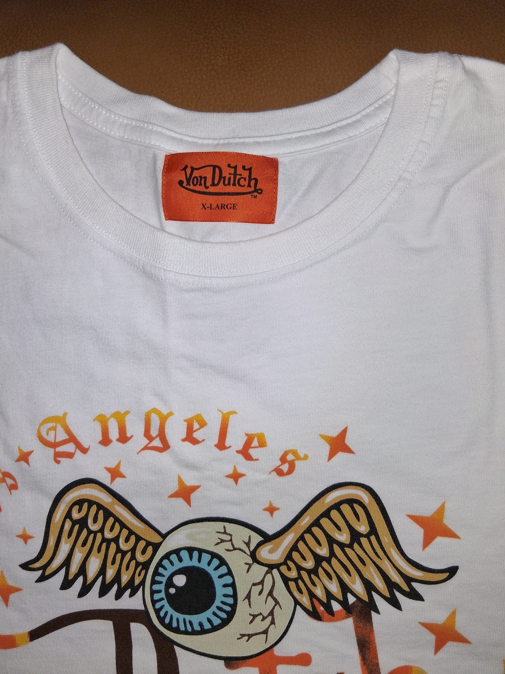 Von Dutch White Tee with Orange Label and Yellow-Accent Graphic